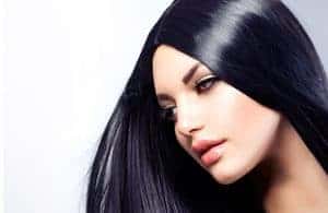 Woman with jet black hair.