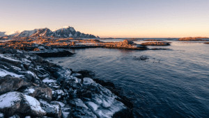 Lake in front of mountains.