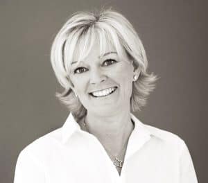 Woman smiling.