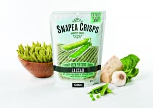 Harvest Snaps Snapea Crisps packet next to bowl of peas and vegetables.