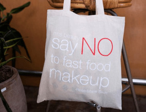 Tote bag hanging off chair.