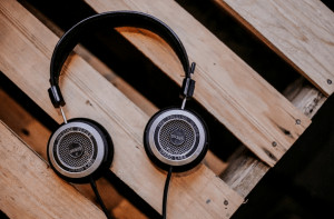 Headphones lying on wooden slats. 