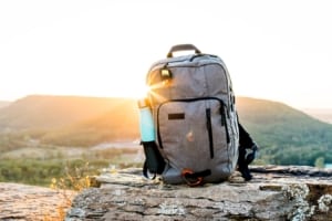 Backpack on hilltop.