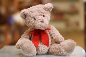 Teddy bear with red bow. 